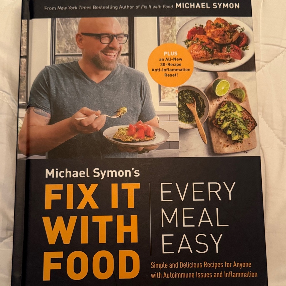 Michael Simon's Fix It With Food Cookbook - Black and Orange Cover